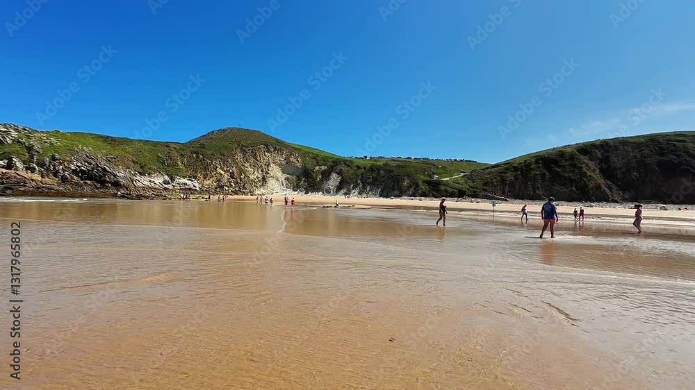 A breathtaking and picturesque beach scene vividly showcasing calm waters and scenic hills beneath a bright sky A breathtaking and picturesque beach scene vividly showcasing calm waters and scenic hills beneath a bright sky