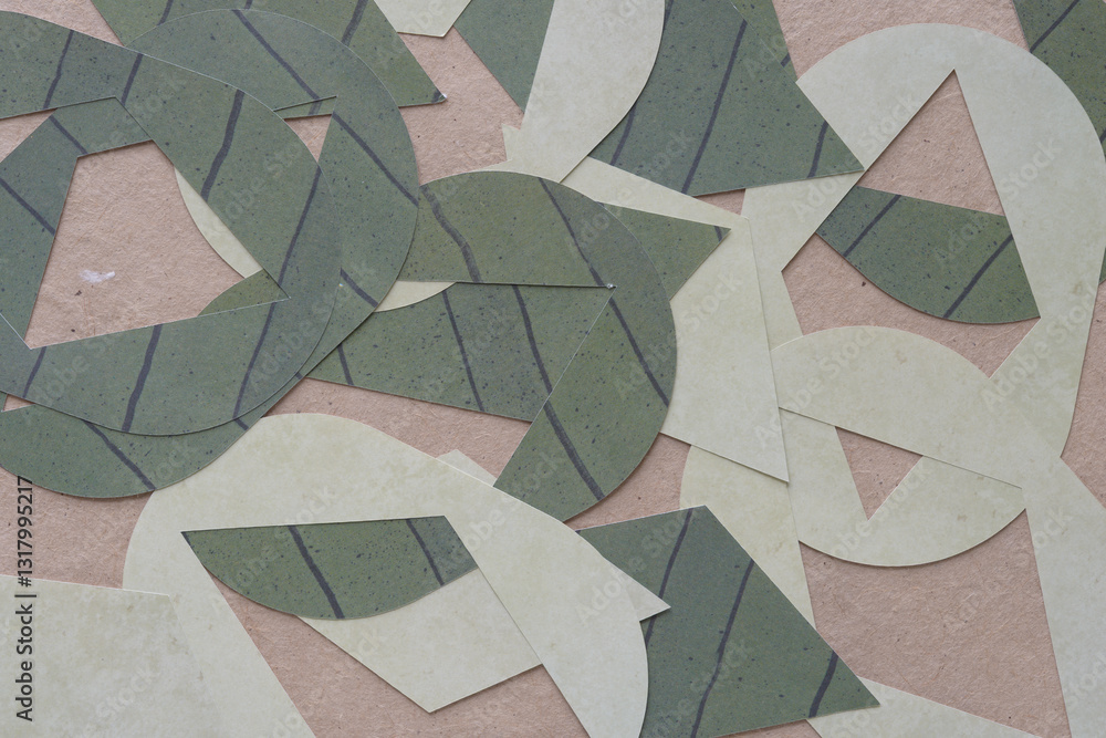 Obraz premium scattered machine-cut pill and diamond paper shapes on plain brown paper