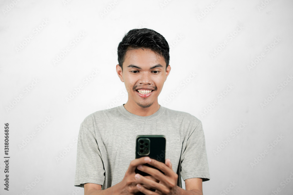 Portrait of happy asian man while getting big discount on e-commerce, isolated on white background Portrait of happy asian man while getting big discount on e-commerce, isolated on white background