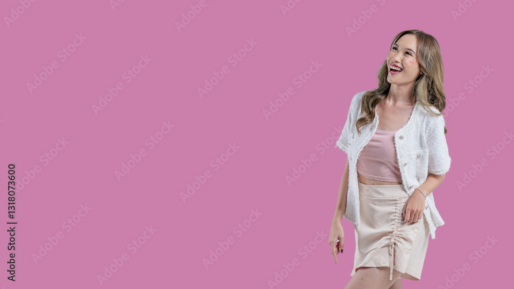 A woman is pointing to the sky with her finger. She is wearing a white jacket and a pink shirt A woman is pointing to the sky with her finger. She is wearing a white jacket and a pink shirt