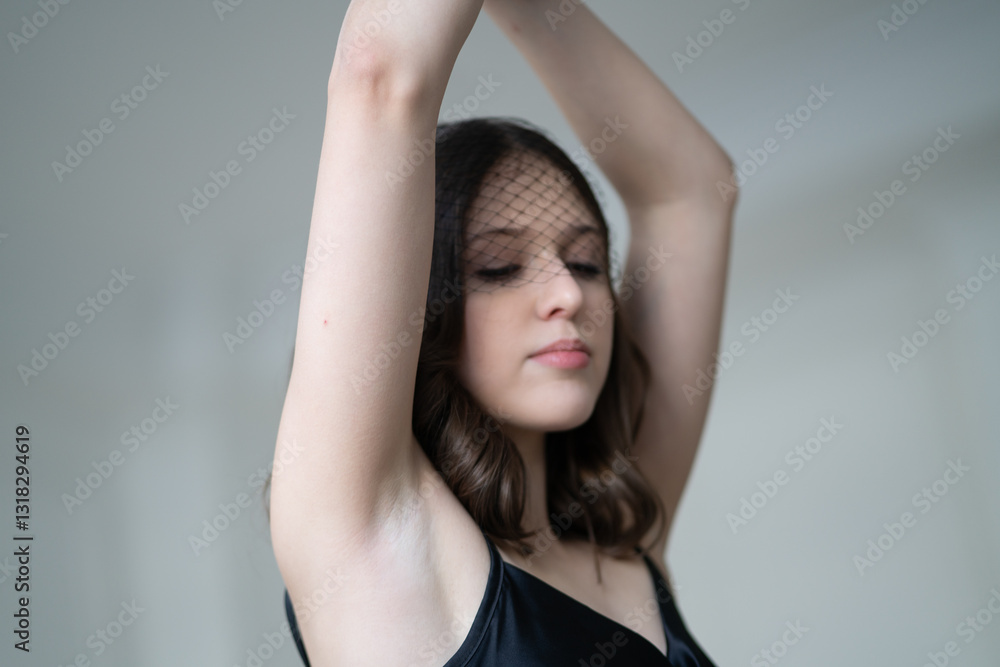 young beautiful woman posing in black lingerie in studio young beautiful woman posing in black lingerie in studio