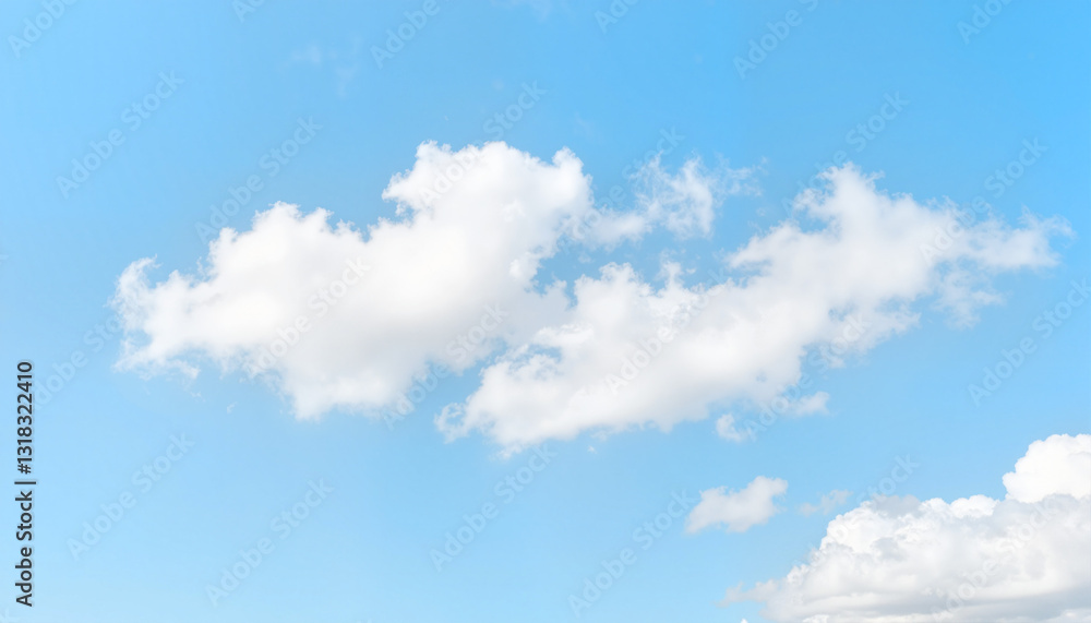 Fluffy white clouds in a clear blue sky Fluffy white clouds in a clear blue sky