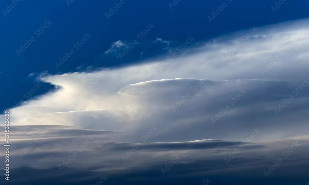 Clouds Forming Against a Blue Sky During Golden Hour Sunset Clouds Forming Against a Blue Sky During Golden Hour Sunset