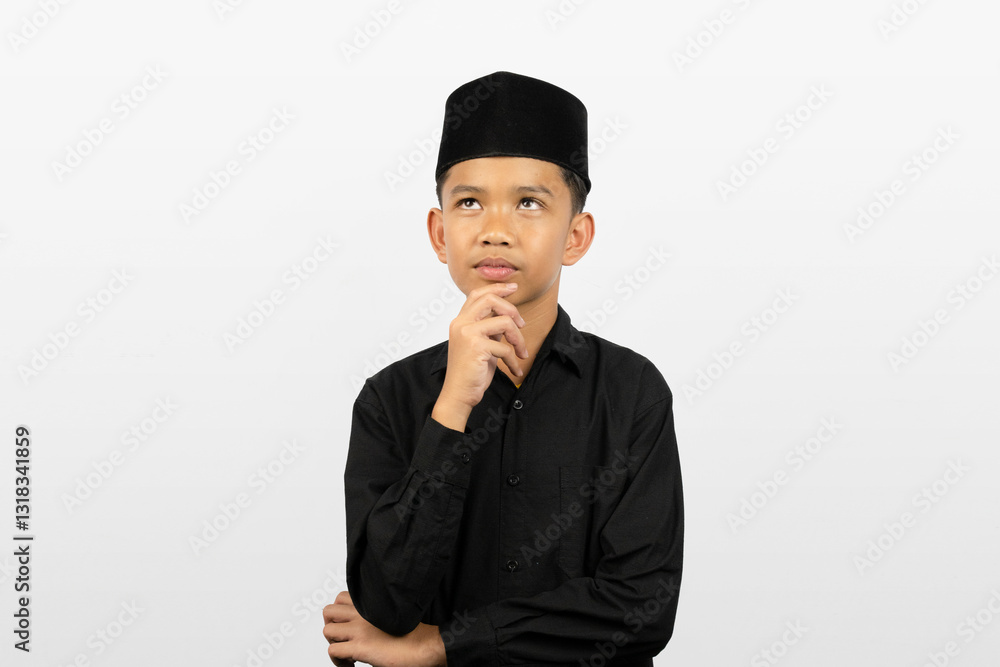 Deep in Thought A Young Muslim Boy Reflecting Deep in Thought A Young Muslim Boy Reflecting