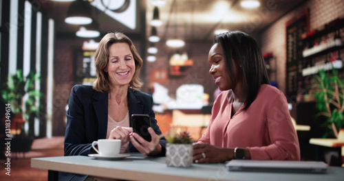 Woman smiling shows friend digital app on smartphone screen happily