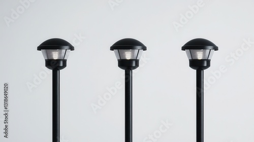 Three Elegant Black Outdoor Lanterns on Poles for Garden Pathway or Street Illumination