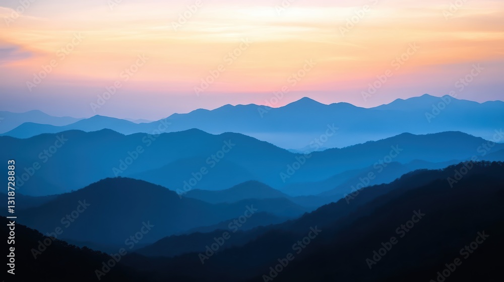 Obraz premium Serene sunset over majestic mountains.