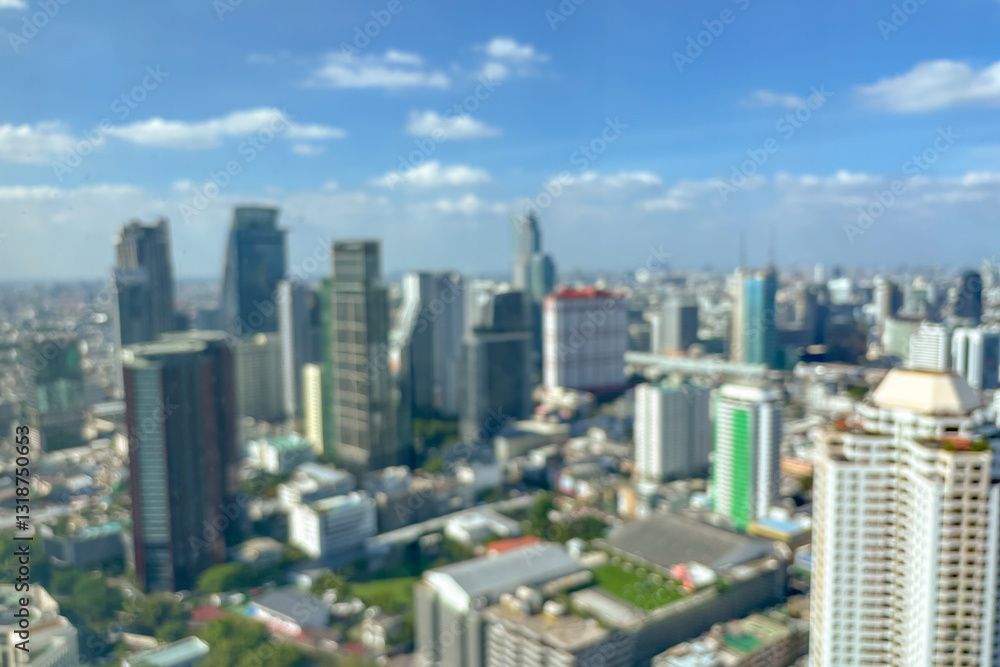 Abstract blur cityscape skyline building with blue sky background
