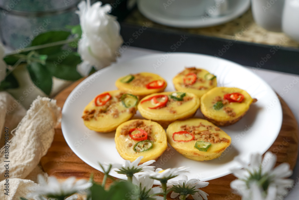 Traditional Malay cake known as Kuih Cara Berlauk. Traditional Malay cake known as Kuih Cara Berlauk.