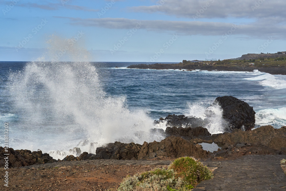 Waves crashing against volcanic rocks........ Waves crashing against volcanic rocks........