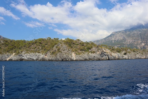 Fototapeta Naklejka Na Ścianę i Meble -  Aegean Sea and costal view near the Dead Sea (Olu Deniz) in Fethiye, Mugla, Turkey.
