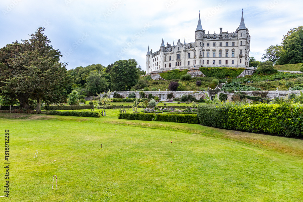 Dunrobin Castle, fairy-tale gem overlooking North Sea, offers breathtaking gardens, exquisite summer blooms. A masterpiece of elegance, lush landscapes meet historic charm, unfold on manicured lawns Dunrobin Castle, fairy-tale gem overlooking North Sea, offers breathtaking gardens, exquisite summer blooms. A masterpiece of elegance, lush landscapes meet historic charm, unfold on manicured lawns