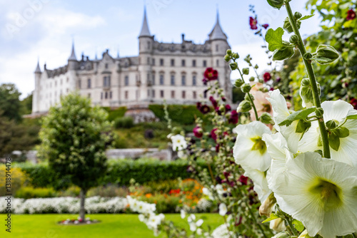 Dunrobin Castle, fairy-tale gem overlooking North Sea, offers breathtaking gardens, exquisite summer blooms. A masterpiece of elegance, lush landscapes meet historic charm, unfold on manicured lawns