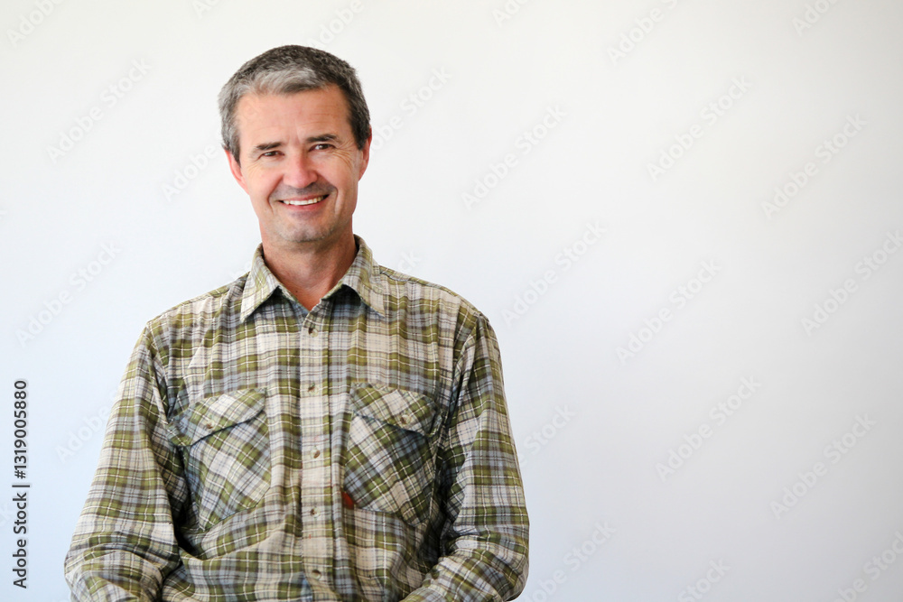 middle-aged man in work clothes middle-aged man in work clothes