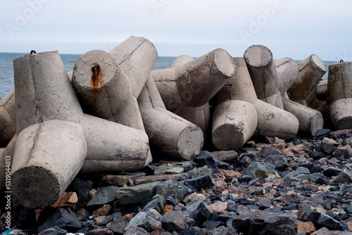 Bai da ong dia beach with tetrapods on the beach against the blue sky Mui Ne, Vietnam.