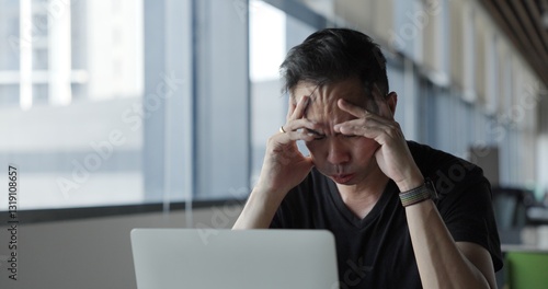 Asian businessman burn out on failed job in office. Elderly office worker expresses emotions Failed to work No success. Financial Communication Business problem. Working too hard overtime