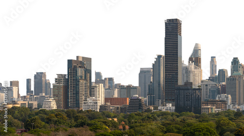 Fototapeta Naklejka Na Ścianę i Meble -  Bangkok skyline with modern skyscrapers and lush green trees in the foreground, isolated on white background. Cityscape concept