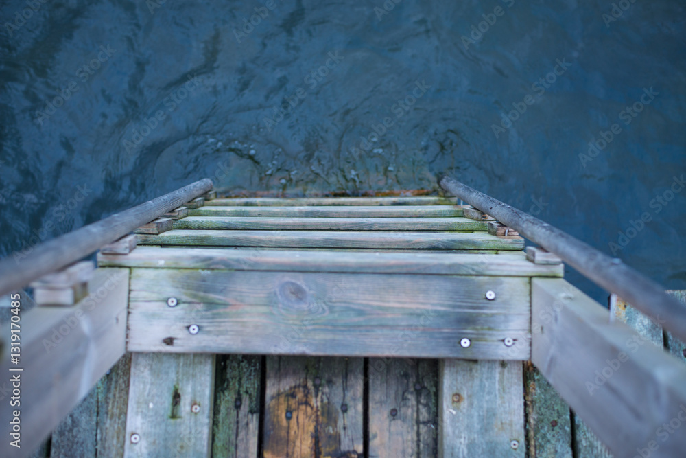 Wooden Ladder Leading into the Blue Sea – Easy Swim Access from Shore Wooden Ladder Leading into the Blue Sea – Easy Swim Access from Shore
