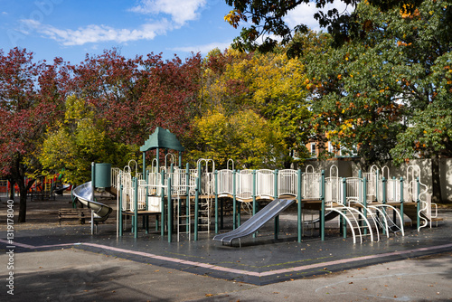Beautiful Playground with Colorful Trees during Fall in Astoria Queens of New York City