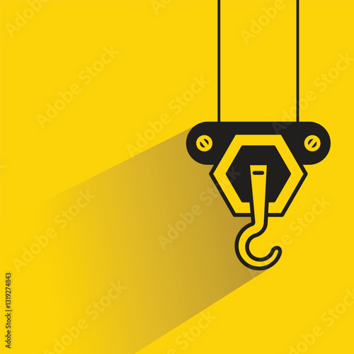 hoist crane hook icon with shadow on yellow background