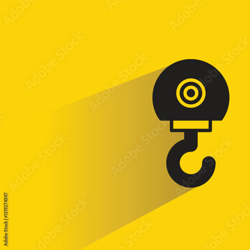 hoist crane hook icon with shadow on yellow background
