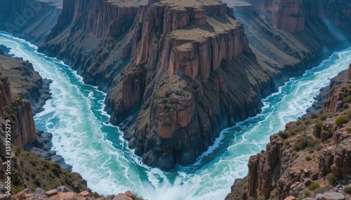 Behold the awe-inspiring spectacle of a powerful river making its way through a stunning canyon, where violent currents and majestic terrain mix to produce a vision of incomparable majesty. 