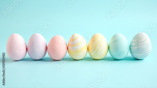 Pastel Easter Eggs in a Row on Blue Background for Holiday Celebration