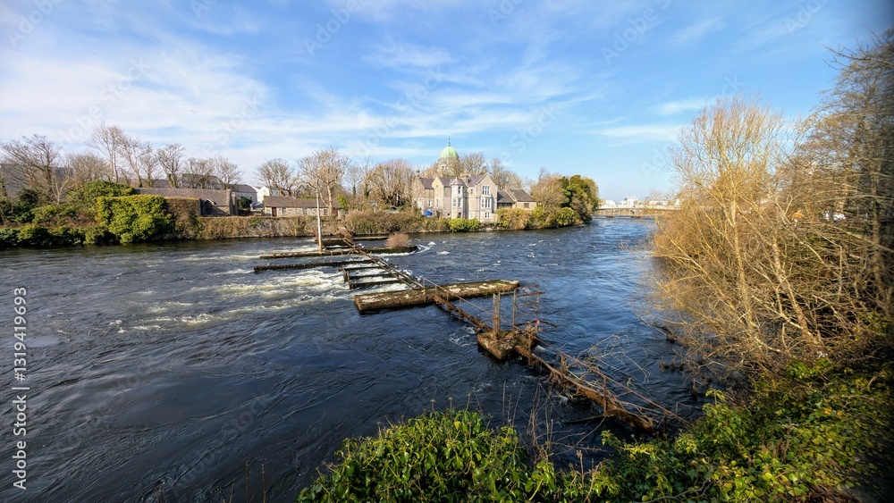 Beautiful scene with historical buildings on shore of Corrib river at Galway city, Ireland, architecture and landmarks, nature background