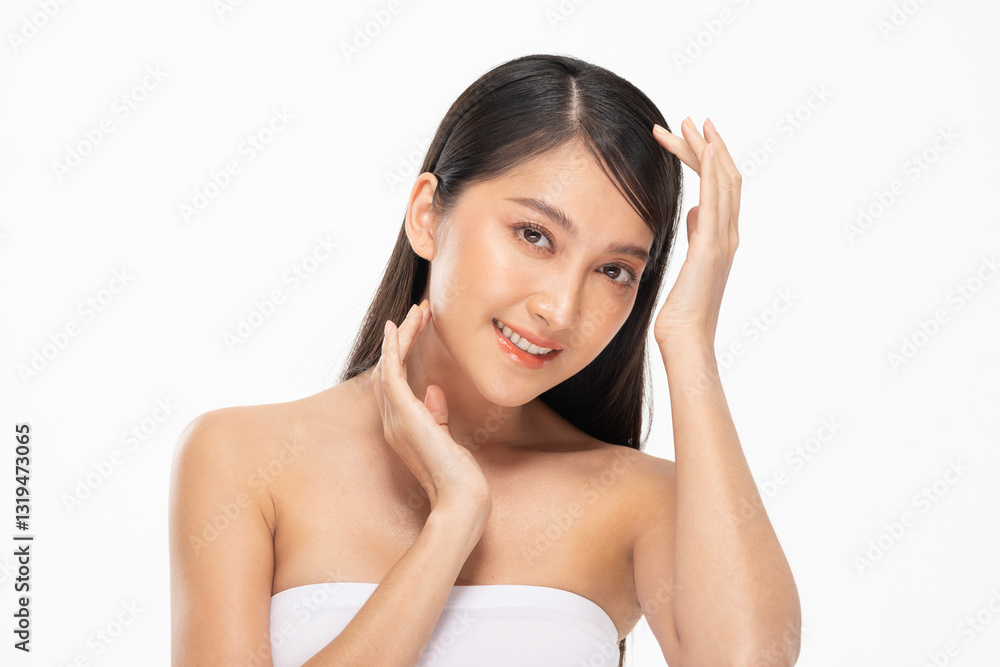 Asian young woman with smooth skin and long dark hair poses confidently against white background, showcasing natural beauty and radiant smile Asian young woman with smooth skin and long dark hair poses confidently against white background, showcasing natural beauty and radiant smile