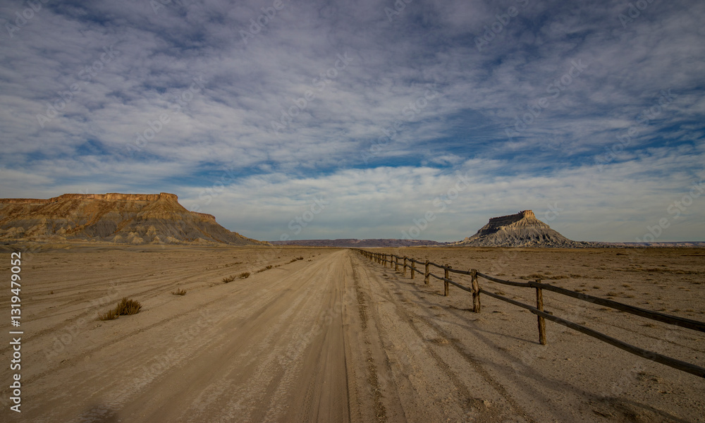 Lonely Desert Road In The Factory Butte Recreation Area In Utah Lonely Desert Road In The Factory Butte Recreation Area In Utah