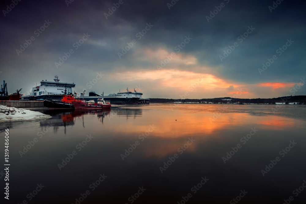 Boats moored at the port of Klaipeda at sunset, Lithuania Boats moored at the port of Klaipeda at sunset, Lithuania