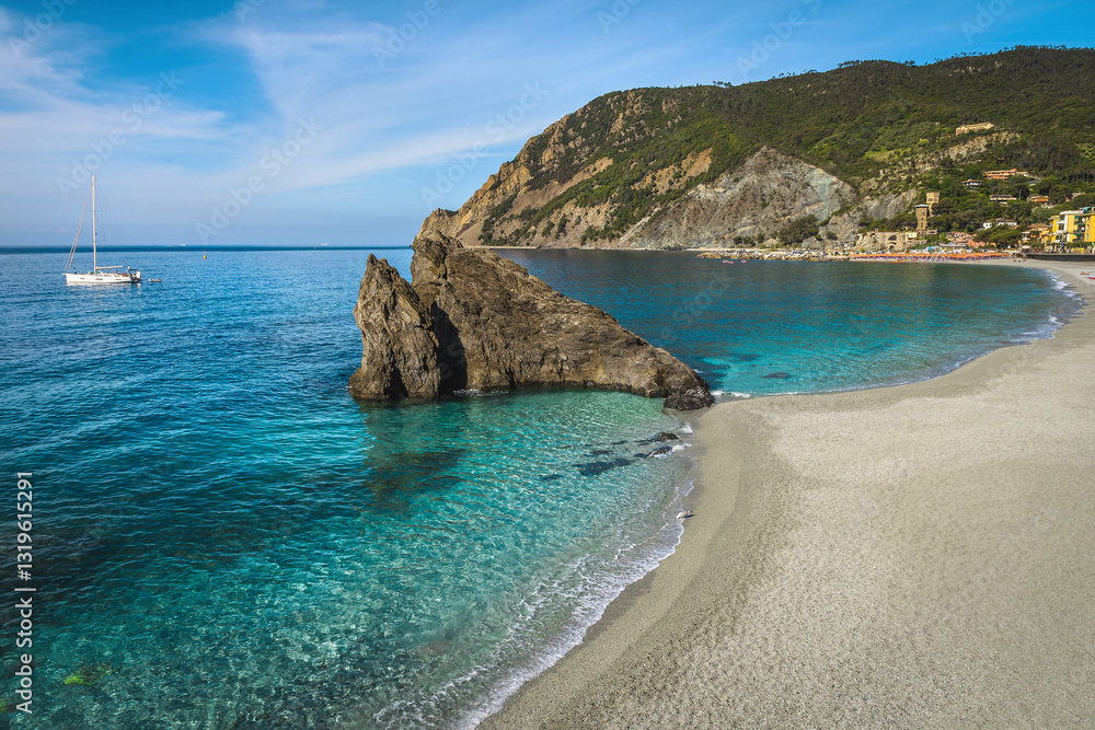 Beautiful gravelly beach and clean transparent sea, Cinque Terre, Italy