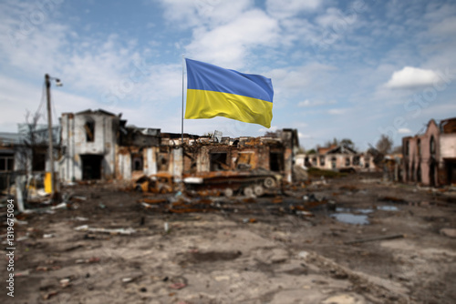 Photos Ukrainian Flag in Front of War-Torn Ruins Under a Clear Sky