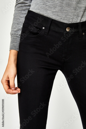 Blue casual denim for women’s with design of edges paired with black footwear and white background, Trendy short denim light blue coloured shorts paired with white heels with white background