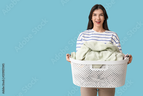 Happy young woman holding b...