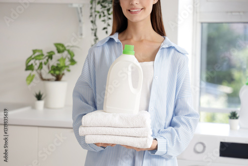 Young woman with laundry de...
