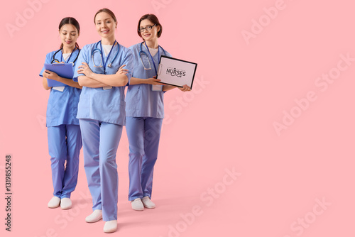 Female doctors with clipboa...