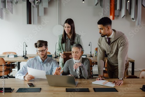 Collaborative Team Meeting in a Modern Office Setting