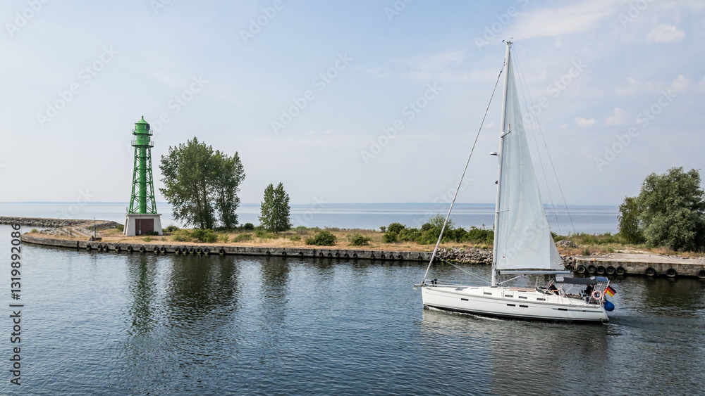 small sailboat, fairway, exit from the channel, signal tower, navigation, sail, sailing small sailboat, fairway, exit from the channel, signal tower, navigation, sail, sailing