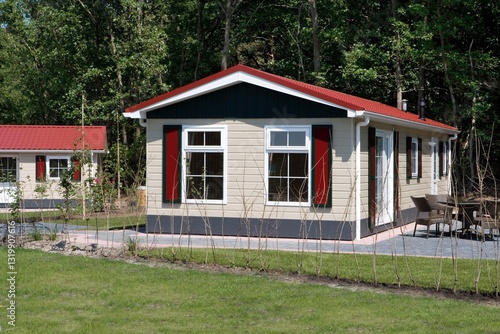 Obraz na płótnie Chalet park, caravan park in the Netherlands. Leisure park with chalets. Mobile home park. w salonie