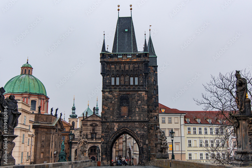 Fototapeta premium Lesser Town Bridge Tower rising above Charles Bridge in Prague
