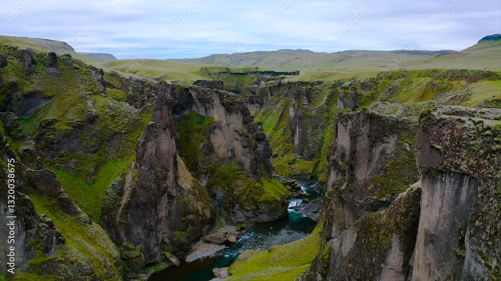 Fjadrárgljúfur is a beautiful canyon in southeast Iceland. The Fjadrá river flows through it. The canyon has steep walls and winding water. Fjadrárgljúfur is a beautiful canyon in southeast Iceland. The Fjadrá river flows through it. The canyon has steep walls and winding water.
