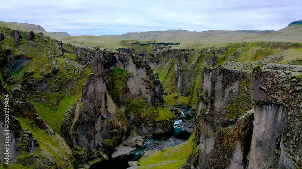 Fjadrárgljúfur is a beautiful canyon in southeast Iceland. The Fjadrá river flows through it. The canyon has steep walls and winding water. Fjadrárgljúfur is a beautiful canyon in southeast Iceland. The Fjadrá river flows through it. The canyon has steep walls and winding water.