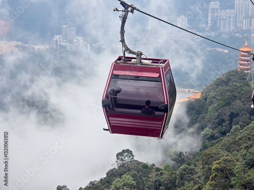 Photography cable car or gondola with misty hills as backdrop, outdoor attraction and modern
