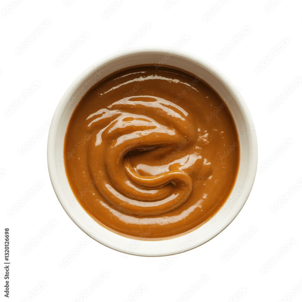 Delicious Caramel Sauce in a White Bowl with Transparent Background Delicious Caramel Sauce in a White Bowl with Transparent Background