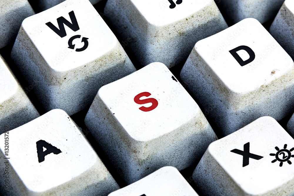 Retro Keyboard with S button in red color. S button keyboard in close up macro Retro Keyboard with S button in red color. S button keyboard in close up macro