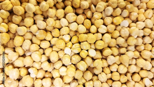 Chickpeas are plants belonging to the Fabaceae family that produce small, yellowish pods.