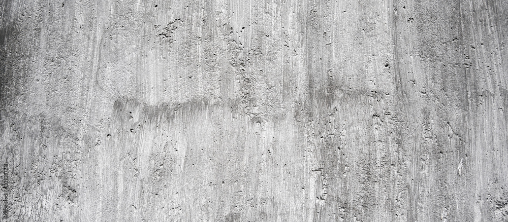 Fototapeta premium Gray rough panoramic background concrete old paint wall, Texture cement crack surface