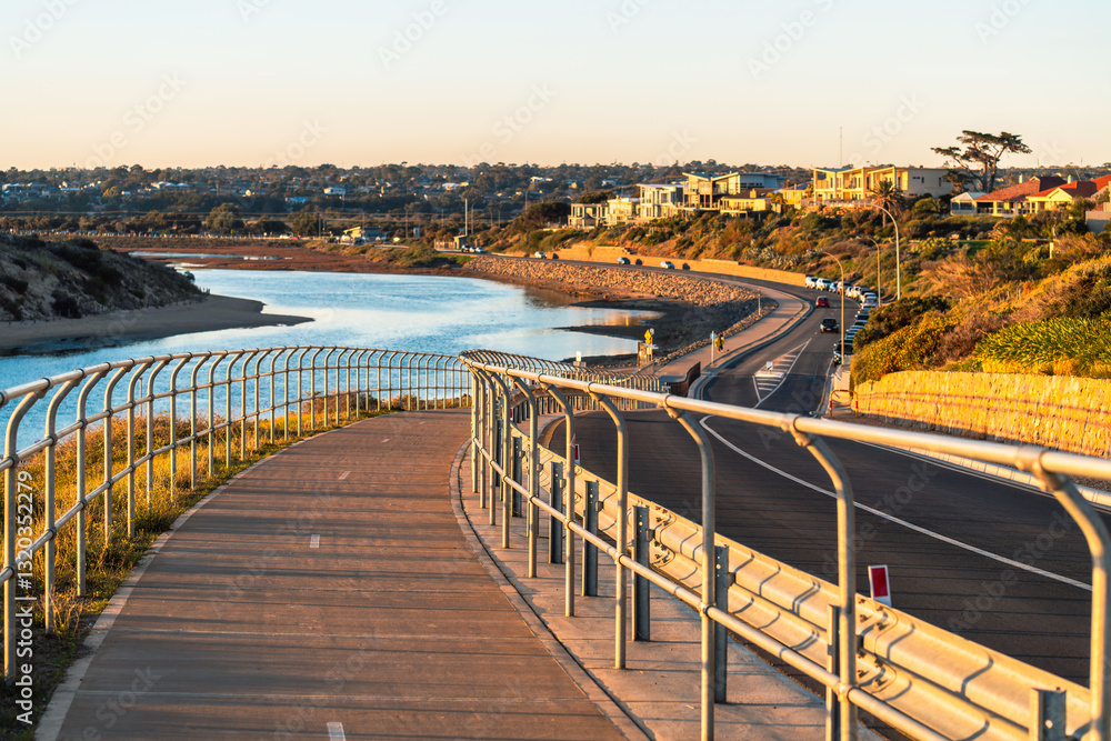 Port Noarlunga shared footpath and bike track along the Onkaparinga River at dusk, South Australia Port Noarlunga shared footpath and bike track along the Onkaparinga River at dusk, South Australia