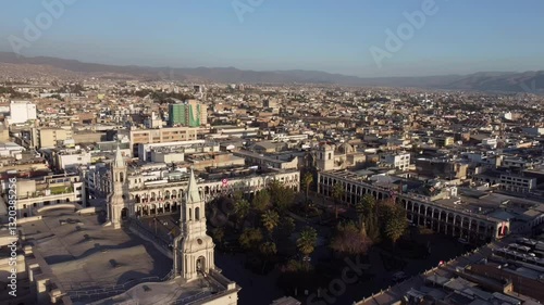 Wallpaper Mural Aerial drone overview of Arequipa, Peru, showcasing the city's architecture and surrounding volcanic landscape in warm sunlight Torontodigital.ca